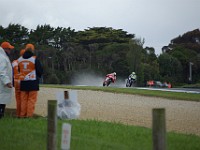 Casey STONER powers past Tony ELIAS Spain, Honda.