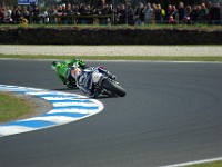 MotoGP warm-up Marco MELANDRI pushes Randy DE PUNIET.