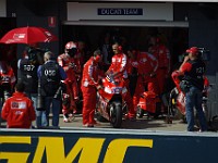 MotoGP Pit Lane Casey about to mount his Ducati.