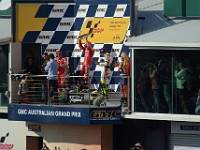 MotoGP Podium Ceremony STONER accepts winner's trophy to the applause of a mildly partisan crowd. ROSSI had his fans as does everywhere.