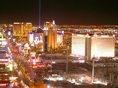 From the top of the Eiffel Tower. The search light comes from the Luxor which is shaped like a pyramid.