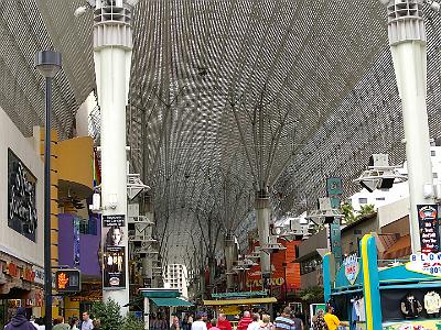 Fremont Street in North Las Vegas. This is probably the world's largest TV screen. It has millions of green, red and blue lamps and displays swirling patterns of colour at night time.