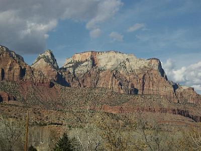 In Zion National Park, you drive along the valley floor and look up at the monuments.