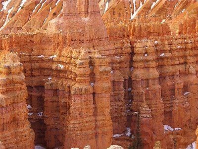 Many of the more durable hoodoos are capped with a special kind of magnesium-rich limestone called dolomite. Dolomite is fortified by the mineral magnesium, dissolves at a much slower rate, and consequently protects the weaker limestone underneath it