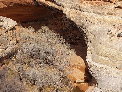 The rock through which the rock was cut is sandstone that was deposited during the Permian about 270-260 MYa.