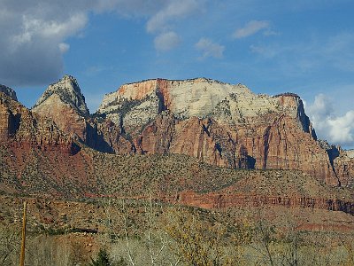 In Zion National Park, you drive along the valley floor and look up at the monuments.