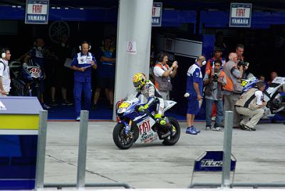 SATURDAY 18 OCTOBER 2008  Rossi rides out to start his qualifying session. You can see the "full wet" tyres on his bike and the steel front disks.