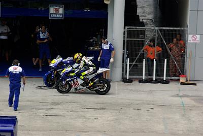 SATURDAY 18 OCTOBER 2008  Rossi returns to the pits with crew chief Jeremy Burgess walking over to talk with him.