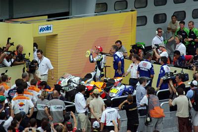 SUNDAY 19 OCTOBER 2008 - RACE DAY  A drenched Burgess and a parched Rossi head towards the podium.