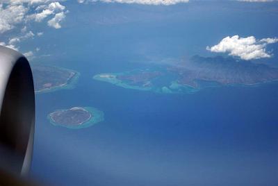 TUESDAY 14 OCTOBER 2008  To the north of Australia, we flew over many small coral islets.      Next: Our first day in Kuala Lumpur