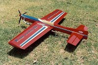 Late 1989 Kareela III at the Australian Nationals in Bendigo  After the repairs, it is too heavy for the tuned pipe so I change it back to a standard ST60 configuration. Notice the fancy scroll is missing from the tailplane and "San Diego" is missing from the fin. Today, this plane is in the roof of our house. I never fly it but I don't want to part with it either.