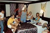 1988 at the US Nationals  Art Adamisin holds court in our motel room at Virginia Beach. Kaz Minato is on the left. The hat belongs to Bob Whitely and he seems to be the receiving "compliments" from Art.