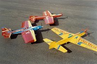 1992 Southern Angel at the US Nationals   I travel to the USA to compete in the US Nationals with my old travelling companions, Brian and Val Eather. Bob Whitely's  Showtime  is the other plane in the picture. Sue Whitely described the plane thus: "It looks as though Walt Disney threw up all over it".