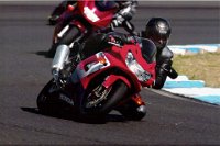 And this is the reason  I fall deeply in love with motorcycles again. I get to be very good at riding motorcycles and very poor at flying model planes. I don't attend a contest of any kind until 8 years later. This is me at Turn 2 at  Eastern Creek in 2002 on my beloved 2001 Honda 929 Fireblade. She's gone now and I miss her still.