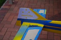 November 2014.    Mark Batty takes the wing and repairs it after which Dennis Percival builds a new fuselage for the wing & stab/elevator.  Here, I've sprayed the base coat in its original gold/yellow colour and cut the graphics for the fin.