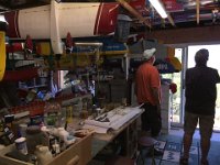 30 January 2018 - Ian Smith  On the work bench is a new model under construction.  Ian tells Grant about the interesting histories of some of the models in the ceiling.