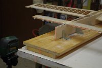 Note added 2017-01-17.  I now use a fuselage jig adjustable in each corner. The bench itself is fairly flat and aligned L x W with a spirit level.