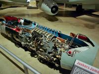 The  JUNKERS JUMO 004 TURBOJET powered the Me 262. The engine had an eight-stage axial flow compressor, six straight-through combustion chambers and a single-stage turbine. In its final production form, it developed a thrust of 1,980 pounds.  More than 5,000 engines were produced. : 2009-11-04 USA Air Force Museum