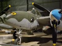 The P-38L on display was donated to the museum in 1961 by the Kaufmann Foundation. The top hats on the left side of the aircraft represent the nine bomber escort missions flown by its pilot, 2nd Lt. Royal D. Frey, with the yellow hat signifying five and the white hats one each. : 2009-11-04 USA Air Force Museum