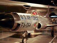 The LOCKHEED F-94A STARFIRE all-weather interceptors were developed from the Lockheed P-80 Shooting Star. The prototype F-94 first flew on July 1, 1949.  Twenty-four rockets were carried in the nose in a ring around the radome, shielded by retractable doors, with an additional 24 in the wing pods, if installed. : 2009-11-04 USA Air Force Museum