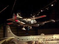 The aircraft in front is CESSNA U-3A which is  the military version of the Cessna 310 twin-engine and was used as for light administrative liaison, cargo and utility transport. Behind it is the De HAVILLAND U-6A BEAVER.  De Havilland Aircraft of Canada manufactured the U-6A  and  delivered nearly 1,000 to the US  armed services. : 2009-11-04 USA Air Force Museum