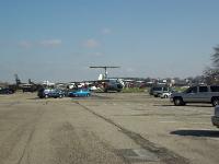 This is the runway of the old Wright Field flight line. It is now a parking lot for museum staff and volunteers.   The area beyond is called the Air Park. : 2009-11-04 USA Air Force Museum