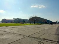 A fourth hangar is planned to be built and it will possibly carry the national insignia for the period 1943-1947 (which is like the middle one but with white bars added). Visible at the far right is the IMAX Theatre (actually spelled that way) : 2009-11-04 USA Air Force Museum