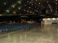 The middle hangar has a large open area in the middle that can be used for special events. This one was a concert of the music of WWII. To the right can be seen the Vietnam War display about the inhumane treatment of American POW's. : 2009-11-04 USA Air Force Museum