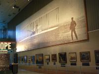 This is a most amazing mosaic from a famous photograph of Wilbur and Orville Wright's first flight at Kitty Hawk, North Carolina on Dec. 17 1903.   The Wright brothers lived in Dayton and constructed the first Wright flyer in their bicycle shop. : 2009-11-04 USA Air Force Museum