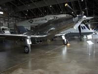 The FISHER P-75 EAGLE was intended to fill the Army Air Forces' 1942 need for an interceptor. Its unique design featured two coaxial contra-rotating propellers connected by dual drive shafts running under the cockpit to a 24-cylinder liquid cooled engine located amidships. : 2009-11-04 USA Air Force Museum