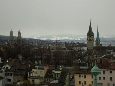 Zurich's three major churches L to R: Grossmünster,  St Peterskirche  and Fraumünster. Lindenhof is in the foreground.