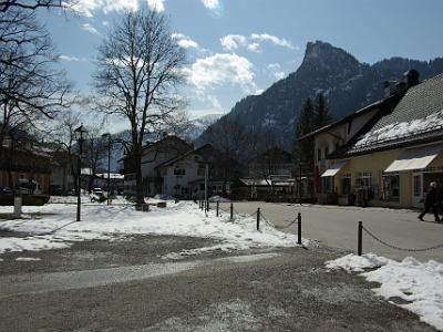 Oberammagau, a quaint Bavarian village with Ammergau mountains in background.