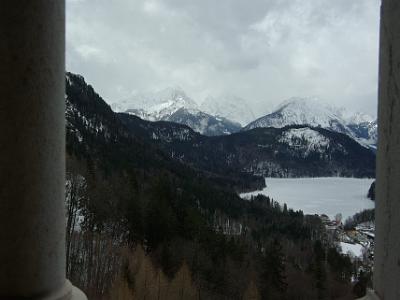 Friday 2009-03-27 &nbsp;&nbsp;&nbsp;   Schloß Neuschwanstein   We aren't allowed to take photos inside the castle but on the way out we can see the frozen Alpsee with the Austrian Alps in the background.