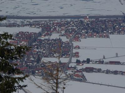 Saturday 2009-03-28 &nbsp;&nbsp;&nbsp;  at the top of Tegelberg Mountain  The little villages of Schwangau and Waltenhofen with the B17 in the lower part of the picture. What appears to be a river in the background is a channel in the frozen lake of Forggensee.