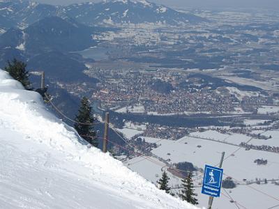 Saturday 2009-03-28 &nbsp;&nbsp;&nbsp;  at the top of Tegelberg Mountain  The village of  Füssen is below us. Near the bridge is St. Mang's Abbey that was once a Benedictine monastery. Ascending tourers?