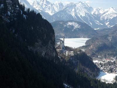 Saturday 2009-03-28&nbsp;&nbsp;&nbsp;   On the way down from Tegelberg Mountain   Neuschwanstein comes into view