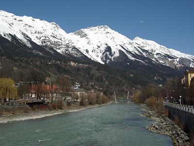 Wednesday 2009-04-01&nbsp;&nbsp;&nbsp;   Alte Innbrücke, Innsbruck   We cross the Alte Innbrücke  (Old Inn Bridge) and return to old town. Hafelelar peak in the Karwendel Mountains towers in the background.