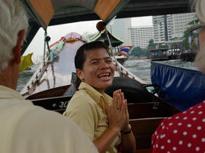 Tuesday 2009-04-07 &nbsp;&nbsp;&nbsp;  Chao Phraya River   Yelli welcomes us aboard with a traditional wai. The wai  is used for greeting, farewell, or acknowledgment and it comes in several forms reflecting the relative status of those involved.  Generally it involves a prayer-like gesture with the hands and a bow of the head.