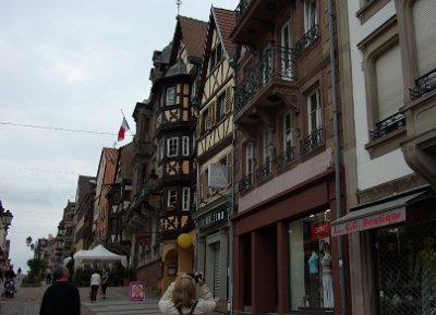 Sunday 13 June, 2010  Three gorgeous buildings in a row: La Chine restaurant, the Town Hall (Hotel de Ville) and the Taverne Katz. The tricolor flies proudly over the Town Hall.