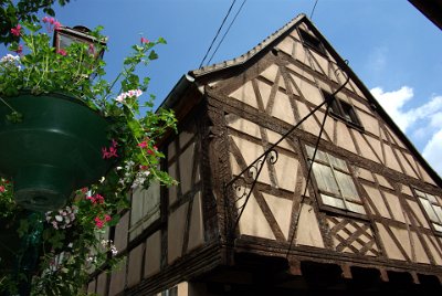 Monday 14 June, 2010  This is an ornate half-timbered house of who knows how many centuries old. The corner posts are elaborately carved and I don't remember seeing many, or any, like this. : 2010-06-14 Strasbourg