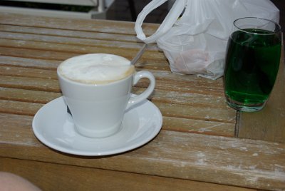 Monday 14 June, 2010  We stop for a coffee but Michele has some weird green Gallic concoction instead. I'm always suspicious of any foodstuff coloured green; it might be kale or worse; rocket! : 2010-06-14 Strasbourg