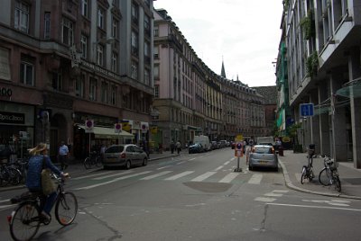 Monday 14 June, 2010  The blue, square road sign shows that this is one-way for cars but two-way for bicycles. Tow-away restrictions apply in this part of the city for illegally parked cars. : 2010-06-14 Strasbourg