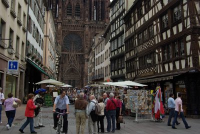 Monday 14 June, 2010  Strasbourg Cathedral de Notre-Dame stands on the site of an ancient Roman temple. The first church was started in 1015  but fire destroyed much of the original Romanesque building.  The cathedral was rebuilt at the end of the 12th century using red stone that was cut  from the nearby mountains of the  Vosges. : 2010-06-14 Strasbourg