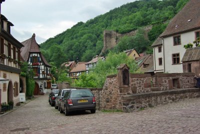 Tuesday 15  June, 2010  The remains of the old castle wall, dating from 1227 is above the Weiss River over which the Fortified Bridge (1514) is built. : 2010-06-15 voges