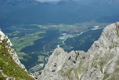 Friday 25  June, 2010  In the distance are the villages of Krün and Wallgau with the River Isar flowing past the two towns. The firing range for the Federal Forces (Bundeswehr) is adjacent to the peak in the exact centre of the picture. : 2010-06-25 Mittenvald