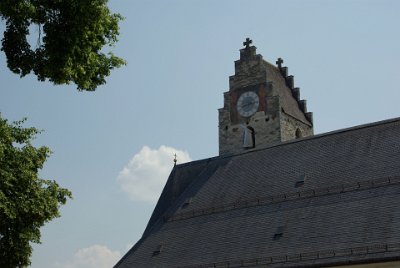 Sunday 27  June, 2010  Rolf told an interesting story about the clock tower of the church. There are three holes in each face of the tower and at night fires  would burn in combinations of the holes to create a message - that is, a binary code. : 2010-06-27 Rolf & Maria