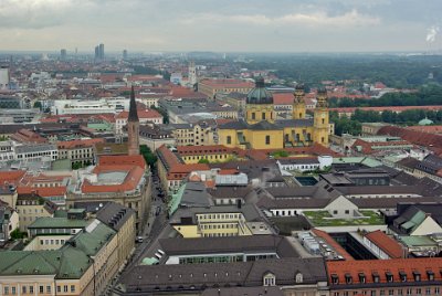 Monday 21  June, 2010  The mustard-yellow building is the     Theatinerkirche    a Catholic church completed in 1690. Down and to the right is the famed    Feldherrnhalle   . Kardinal-Faulharber-Strasse is a pedestrian plaza below us that leads to yet another church, the Salvatorkirche, the former cemetery church of Frauenkirche. : 22010-06-21 Munich