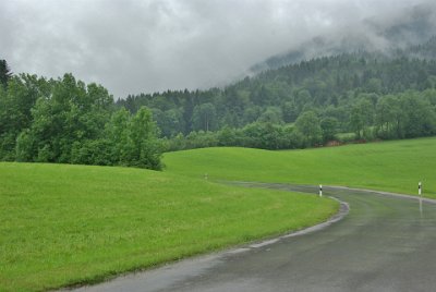 Saturday 19 June, 2010  We return to the Guest House where it is still raining but very beautiful and totally relaxing. This small road leads to to the very small village of Wackersberg. : 2010-06-19 Bad Tolz