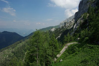 Friday 2 July, 2010   The bus ride was 6 km on a single lane road. The drivers are obviously used to driving the winding road, so the speed up was a fast & constant (my guess) 70kmh. The road cost 30 million RMs to build (about &euro;150 million in 2007 euros) and includes five tunnels but only one hairpin turn. : 2010-07-02 Eagles nest