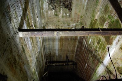 Friday 2 July, 2010  This is an elevator shaft intended to connect to  Hitler's     Berghof    bunker with a planned additional tunnel system some 50 feet beneath where we are standing. The rusting steel was the mounts for the elevator machinery. : 2010-07-02 Eagles nest